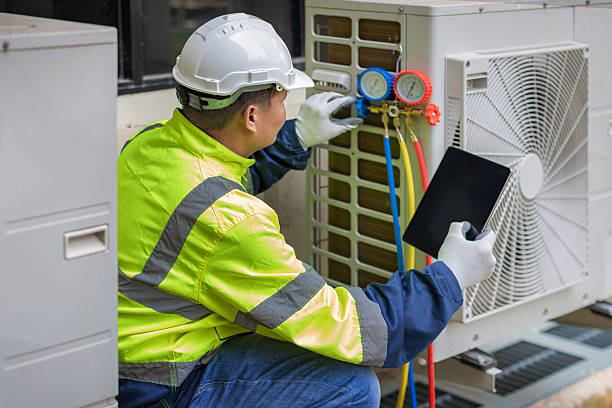 Professional Air Conditioning Repair technician working in Harrah, OK